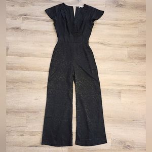 EUC Black floral flared jumpsuit Francescas size medium